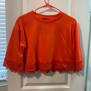 Coral/orange lace detailed crop top!
